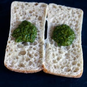 Panini cut in half with Chimichurri sauce